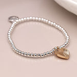 Silver plated bead and golden embossed heart bracelet