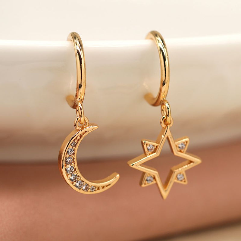 Golden mismatched crystal star and moon c-hoop earrings