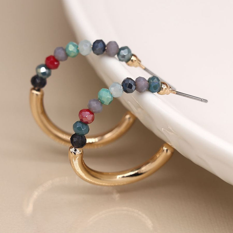 Golden open half hoop and multicoloured bead earrings