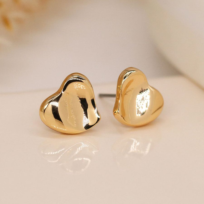 Golden wavy surface heart stud earrings