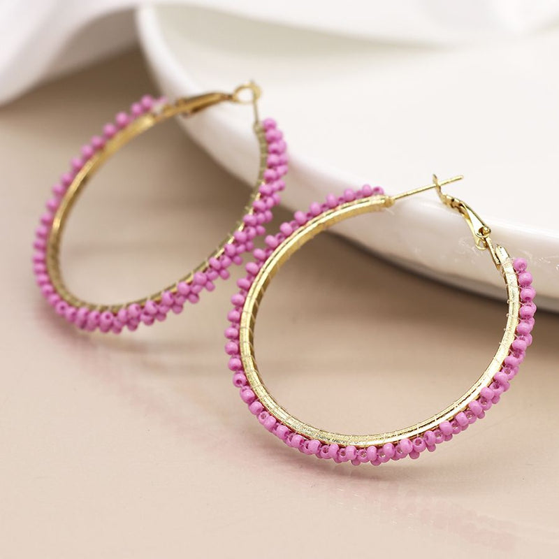Golden and pink bead large hoop earrings