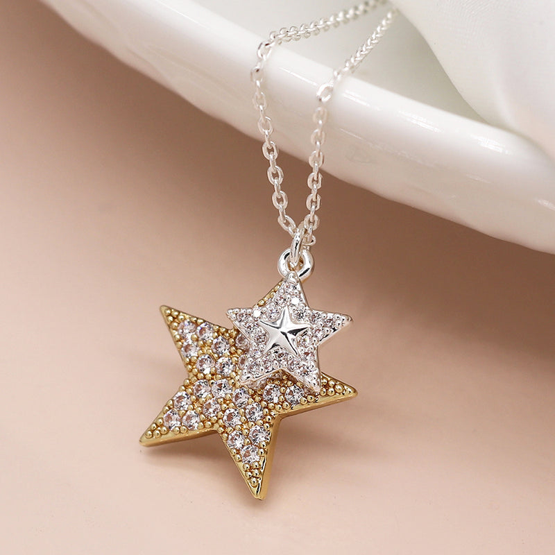 Faux gold and silver plated double crystal inset star necklace