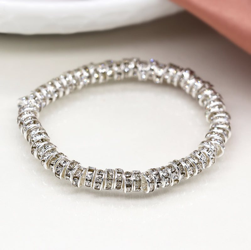 SILVER PLATED AND CRYSTAL EDGED DISC BEAD STRETCH BRACELET