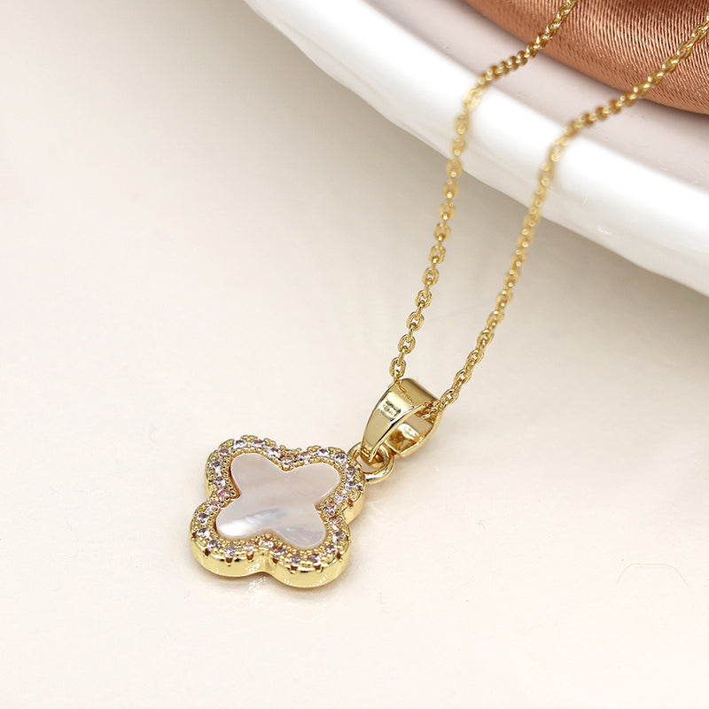 Golden crystal edged quatrefoil necklace