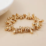 Golden organic droplets bracelet