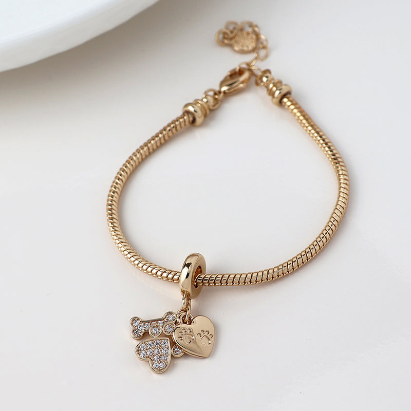 Golden crystal paw, bone and heart print charm bracelet