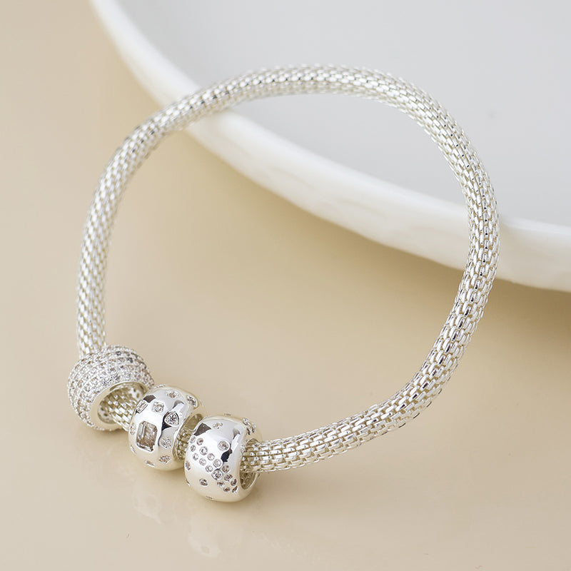 Silver plated mesh and crystal triple ring bracelet