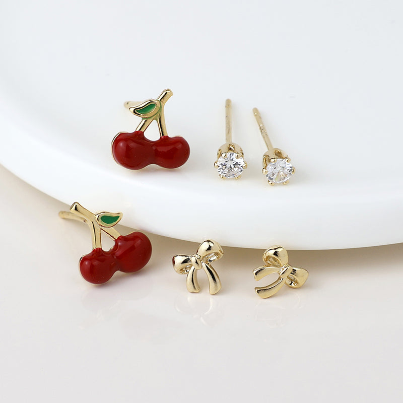 Golden toadstool, bow and cherry stud earring set