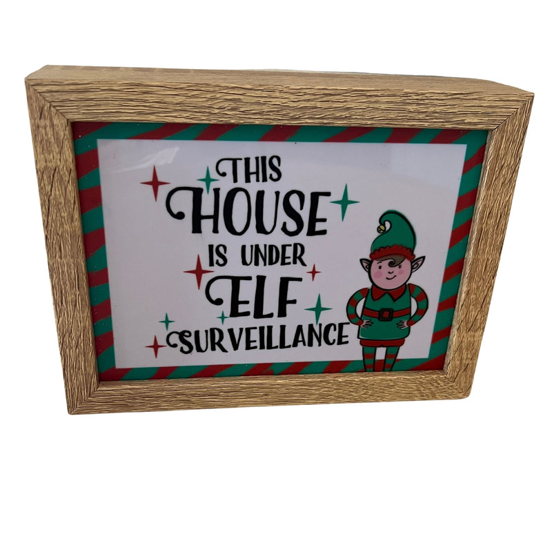 This house is under elf surveilance light up sign