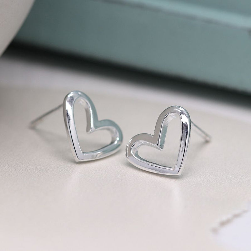 Sterling silver cut-out irregular heart stud earrings