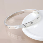 Silver plated crystal stars hinged bangle