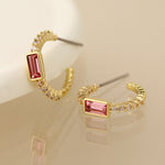 Golden hoop stud earrings with pink and clear crystals