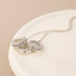 Silver plated triple mini crystal rings necklace
