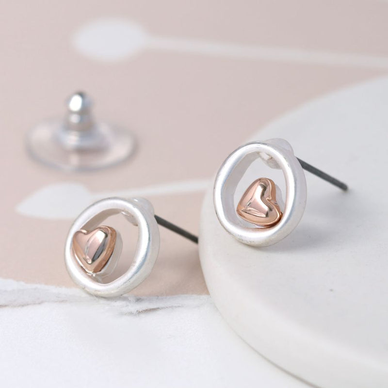 Silver plated stud earrings with a little rose gold heart