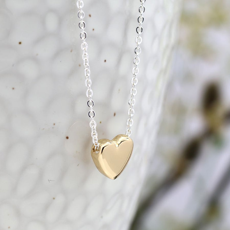 Silver plated necklace with golden heart