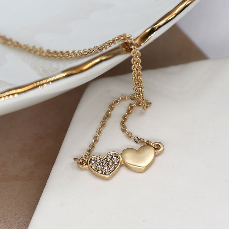 Golden double heart and crystals necklace