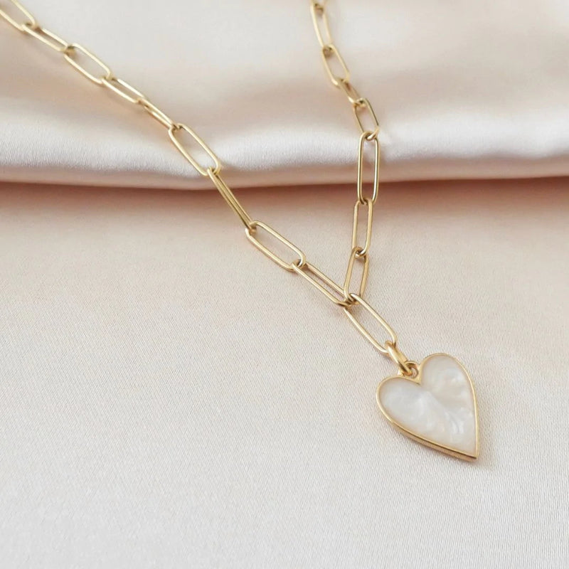 Paperclip necklace featuring marble heart charm