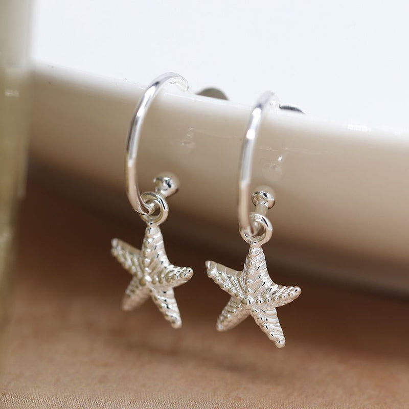Sterling silver starfish hoop earrings